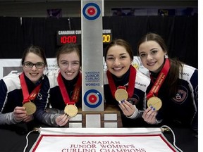 Nova Scotia skip Mary Fay, third Kristin Clarke, second Karlee Burgess and lead Janique LeBlanc (left to right) hold the trophy after capturing the women's title at the Canadian junior curling championships in Stratford, Ont., Sunday, Jan.31, 2016. Nova Scotia beat B.C. 9-5 in the women's final. THE CANADIAN PRESS/HO-Michael Burns