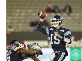 Toronto Argonauts' quarterback Ricky Ray throws during second half CFL football action against the Montreal Alouettes in Hamilton, Ont., on October 23, 2015. Argos head coach Scott Milanovich announced Sunday that Ray will make his first start of the season when the Argonauts host the B.C Lions next Friday. THE CANADIAN PRESS/Peter Power