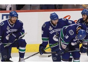 The Vancouver Canucks must show up when they host Boston on Saturday night, or admit they might not be the team they think they are.