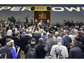 Denver Broncos' Peyton Manning answers a question during Opening Night for the NFL Super Bowl 50 football game Monday, Feb. 1, 2016, in San Jose, Calif.