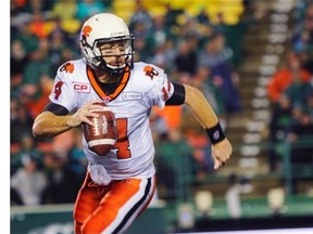 :B.C. Lions quarterback Travis Lulay looks for an opening on the run during second half CFL action against the Saskatchewan Roughriders in Regina on Friday, July 17, 2015.