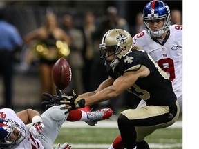 New Orleans quarterback Drew Brees passed for career highs of 511 yards and seven touchdowns in the Saints' 52-49 win.