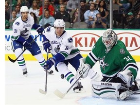 'They were the best team in the West in the first quarter of the season,' Vancouver Canucks winger Alex Burrows (above, vying for the puck with Dallas Stars goalie Antti Niemi last month), says of the high-flying Stars. 'They can score goals and can make you pay if you are not sharp defensively.'