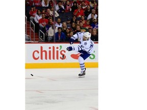 Toronto Maple Leafs goalie James Reimer looks back at the puck after allowing a goal on a dump in against the Detroit Red Wings.