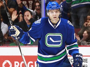 Radim Vrbata #17 of the Vancouver Canucks celebrates after scoring against the Buffalo Sabres during their NHL game at Rogers Arena December 7, 2015 in Vancouver, British Columbia, Canada.