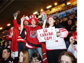 Supporters of Team Canada watch during the 2016 IIHF World Junior Ice Hockey Championship match between USA and Canada in Helsinki, Finland Saturday, Dec. 26, 2015.