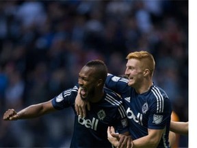 Vancouver Whitecaps Kendall Waston and Tim Parker celebrate a goal - something they hope they get to do many more times before their post-season is over.