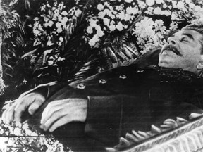 Stalin lies in state in March 1953. Mourning Russians, 16 abreast, formed a 10-mile line to view the body of the former dictator.