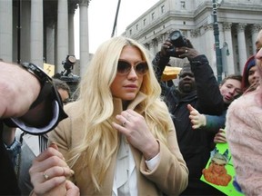 Pop star Kesha leaves Supreme court in New York, Feb. 19. Kesha is fighting to wrest her career away from a hitmaker she says drugged, sexually abused and psychologically tormented her — and still has exclusive rights to make records with her. Producer Dr. Luke says the singer is slinging falsehoods and ruining his reputation to try to weasel out of her recording contract and strike a new deal. Mary Altaffer/The Associated Press