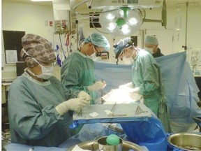 VGH surgeons perform a kidney transplant, the type of surgery for which patients will have to wait longer until a nursing shortage is rectified.