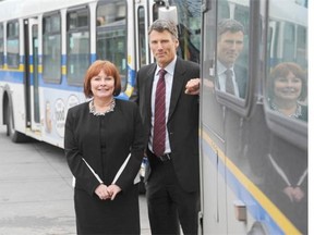 Surrey, BC: JANUARY 16, 2015 -- Vancouver, BC mayor Gregor Robertson and Surrey, BC mayor Linda Hepner at the Surrey Central bus loop Friday, January 16, 2015. Robertson and Hepner were voted in as chairman and vice chairman respectively, to Translink's mayor's council Friday.  (Photo by Jason Payne/ PNG) (For story by Kelly Sinoski)  [PNG Merlin Archive]