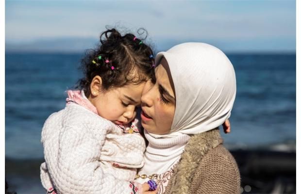 Immigrant groups ask for more time to settle Syrian refugees ...