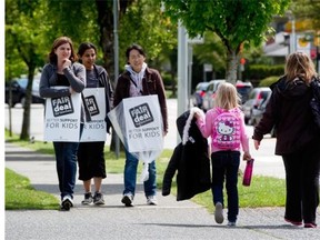 Teachers on strike outside Killarney Secondary School in Vancouver on May 26, 2014.