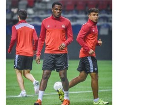 Team Canada Cyle Larin, centre, during a training session at BC Place Stadium on Monday. Team Canada plays Honduras on Friday in a FIFA 2018 World Cup qualifier match.