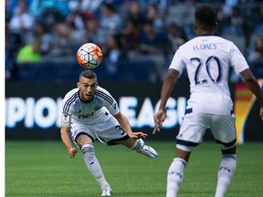 Russell Teibert (left) and Deybi Flores will vie for midfield spots this coming season with the Whitecaps. (Darryl Dyck, Canadian Press files)