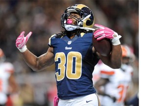 Todd Gurley #30 of the St. Louis Rams celebrates after making a touchdown against the Cleveland Browns in the third quarter at the Edward Jones Dome on October 25, 2015 in St. Louis, Missouri.