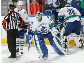 Vancouver Canucks goaltender Jacob Markstrom replaces goaltender Ryan Miller (30) in the middle of the shoot-out against the Florida Panthers on Sunday in Sunrise, Fla. The Panthers defeated the Canucks 5-4 in a shoot-out.