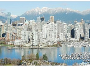 FILE — False Creek and the North Shore Mountains frame the Vancouver skyline as seen from Fairview December 30, 2010. British Columbia homeowners can celebrate the latest news from the Central 1 Credit Union, but would-be home buyers could face even more pressure.