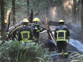 Vancouver fire department battle an early morning fire in a heavily wooded area of Stanley Park.
