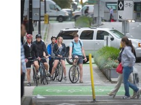 The next five years could see a dozen new bike lanes across Vancouver and major upgrades to cycling infrastructure across the city. Cyclists on Hornby street bike lane in Vancouver, B.C., September 9, 2014.