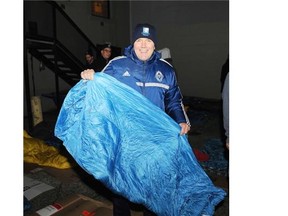 More than four dozen Vancouver-area executives, celebrities and community leaders traded their usual comforts for a freezing night in a downtown alley to raise money for a program helping street youth. Vancouver Whitecaps' president Bob Lenarduzzi prepares to sleep outside in 2013 to fundraise and raise awareness for Covenant House and street youth in Vancouver. He'll be back again at this year's edition of the sleep out.