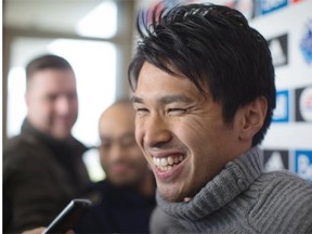 Vancouver Whitecaps striker Masato Kudo, who was acquired by the MLS soccer team in the off-season, laughs while speaking to reporters with the assistance of a translator during a media day before a pre-season training camp begins in Vancouver on Friday, Jan. 22, 2016.