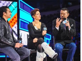 Waneek Horn-Miller, centre, talks onstage with aboriginal rights advocates, Wab Kinew and Tom Jackson, at We Day Manitoba, November 2015. Colby Spence/Free The Children