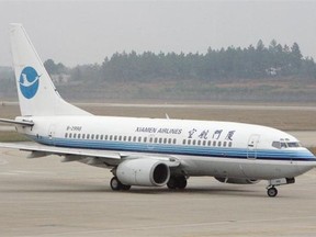 A Xiamen Airlines Boeing 737 at the Changsha airport in Hunan Province. The airline also flies the Boeing 787 Dreamliner.