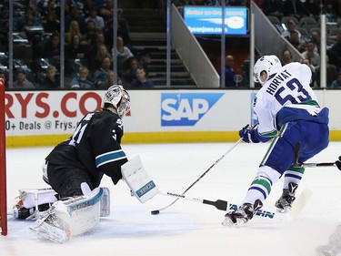 Bo Horvat #53 of the Vancouver Canucks scores a goal on Martin Jones #31 of the San Jose Sharks at SAP Center on March 31, 2016 in San Jose, California.  (Photo by Ezra Shaw/Getty Images)