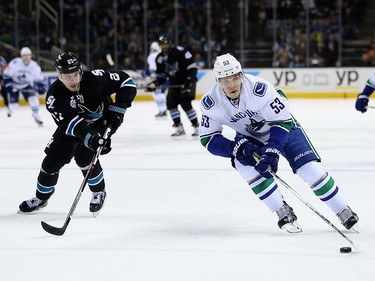 Bo Horvat #53 of the Vancouver Canucks skates away from Joonas Donskoi #27 of the San Jose Sharks on his way to scoring a goal after he stole the puck at SAP Center on March 31, 2016 in San Jose, California.  (Photo by Ezra Shaw/Getty Images)
