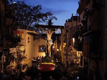 An effigy of Jesus Christ on the cross is carried during the "Cristo de la Fe ", populary known as the gypsy Christ, parade during a Holy Week procession on April 1, 2015 in Alicante. Christian believers around the world mark the Holy Week of Easter in celebration of the crucifixion and resurrection of Jesus Christ Christian believers around the world mark the Holy Week of Easter in celebration of the crucifixion and resurrection of Jesus Christ. JOSE JORDAN/AFP/Getty Images