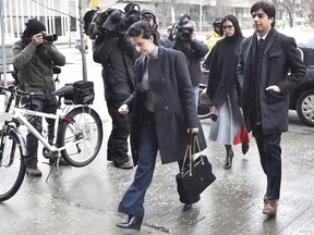 Former CBC radio host Jian Ghomeshi and his lawyer Marie Henein arrive at a Toronto court on Wednesday, Feb. 10, 2016.