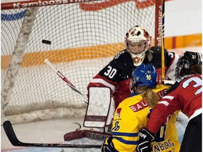 Team Canada goaltender Emerance Maschmeyer makes a save in a 2014 Four Nations Cup game against Sweden in Kamloops. — The Canadian Press files