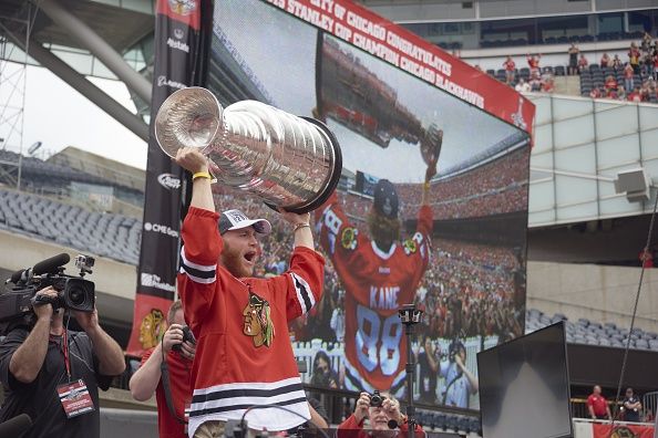 Chicago Blackhawks Patrick Kane (88) victorious holding up Stanley Cup during Victory Parade at Soldier Field. (Photo by Megan Bearder /Sports Illustrated/Getty Images) 