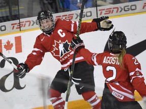 Meghan Acosta set up Marie-Philip Poulin for the game's first goal. THE CANADIAN PRESS/Ryan Remiorz