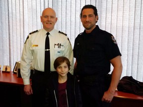 Child star Jacob Tremblay poses with his dad, Jason (right), and VPD Chief Adam Palmer.