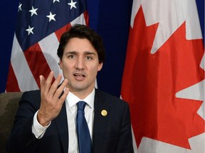 Prime Minister Justin Trudeau says he will offer a full apology in the House of Commons next month for a decision by the government in 1914 to turn away a ship carrying hundreds of South Asian immigrants.