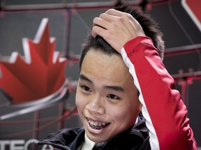 Nam Nguyen reacts as he watches his performance while waiting for his marks for his short program during the men's competition at the 2015 Canadian Figure Skating Championships in January, 2015, Kingston, Ont.