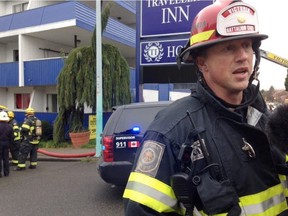 Victoria Acting Battalion Chief Wayne Moody at a fire at the defunct Traveller's Inn Hotel on Monday, March 21: "I'm going to say there is hundreds of thousands of dollars damage here."