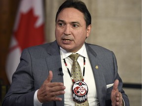 Assembly of First Nations National Chief Perry Bellegarde participates in TV interviews as he reacts to the federal budget on Parliament Hill, Tuesday, March 22, 2016 in Ottawa.