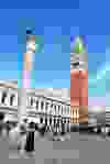 Venice’s famous bell tower rises above St. Marks Square.