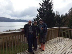 Pictured on the deck overlooking the Inlet of Haida Gwaii of the four-bedroom house thats all set up for a Syrian family of eight are, from left, Bruce Ives, Fran Fowler, and Carl Coffey. The three are core committee members of Operation Refugees Haida Gwaii, which hopes to welcome two families to the northern archipelago and one to their village, which in 2006 had a population of 948.