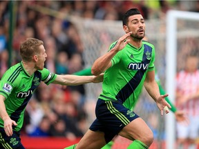 Southampton plays a very direct style, with the focus on towering Italian striker Graziano Pelle, right.