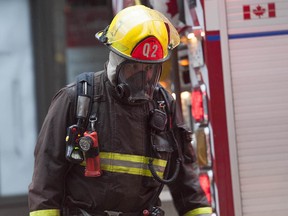 File: Vancouver firefighters battle a blaze.