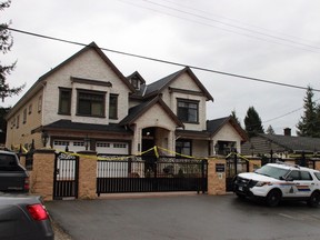 Surrey RCMP went to this home in the 10000-block 128A Street early Sunday in response to a report of a domestic disturbance. — Shane MacKichan/for PNG