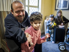 Mohamad El Refaie, left, and his wife Shamia El Refaie are Syrian refugees who will soon move from a Surrey hotel into a permanent home.