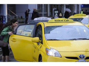 A new Ipsos Reid poll for the Taxi Association of Vancouver shows most people want government to regulate ride-sharing companies like Uber. Mark van Manen /PNG Staff photographer [PNG Merlin Archive]