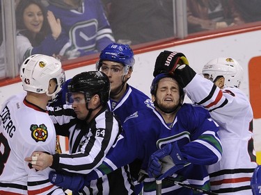 Vancouver Canucks  Linden Vey 7 battles the Chicago Blackhawks in Rogers Arena  in Vancouver on March 27, 2016.       Mark van Manen /PNG Staff photographer   see Iain MacIntyre Vancouver Sun Jason Botchford Province Sports  News /and Web. stories.   Linden Vey  00042415A [PNG Merlin Archive]