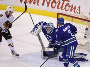 Canucks goalie Ryan Miller has the first goal of the game by the Chicago Blackhawks' Tomas Fleischmann get past him during the first period at Rogers Arena in Vancouver on Sunday. Mark van Manen/PNG
