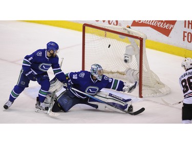 Vancouver Canucks Ryan Miller has puck get by him  as  the Chicago Blackhawks Teuvo Teravainen  scores in the 3rd period   in Rogers Arena  in Vancouver on March 27, 2016.       Mark van Manen /PNG Staff photographer   see Iain MacIntyre Vancouver Sun Jason Botchford Province Sports  News /and Web. stories.     Teuvo Teravainen    00042415A [PNG Merlin Archive]